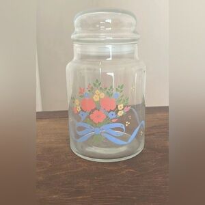 Vintage bouquet ribbons glass container